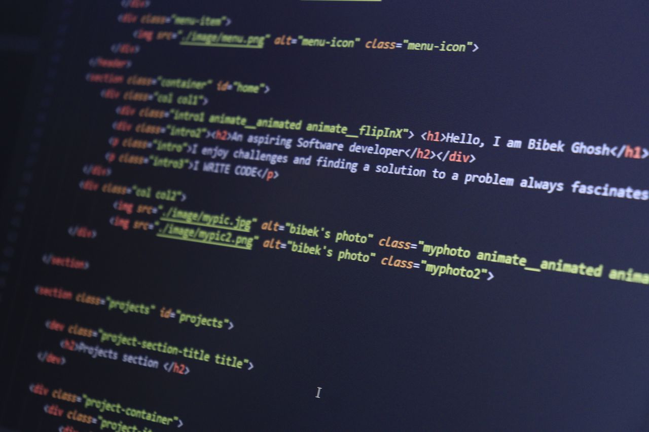 Mastering the First Impression: Your intriguing post title goes here Colorful HTML code displayed on a computer screen for programming projects.